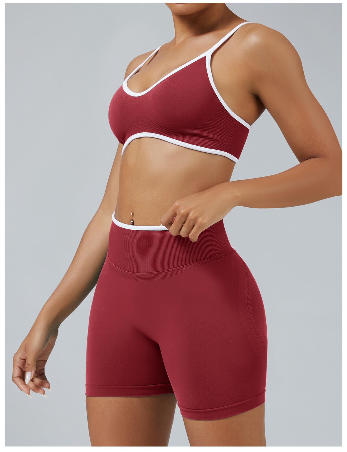 Cherry red seamless sports bra with white piping